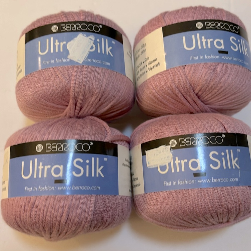 NWT “UltraSilk” ribbon texture yarn from Berroco. Bundle of 4 50-gm cakes.